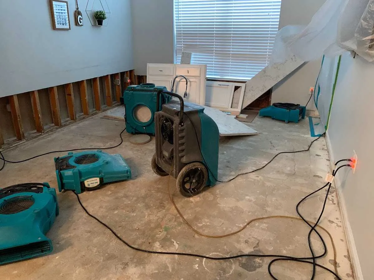 Dehumidifier in flood-cut room for Water Damage Restoration in Ashton-Sandy Spring